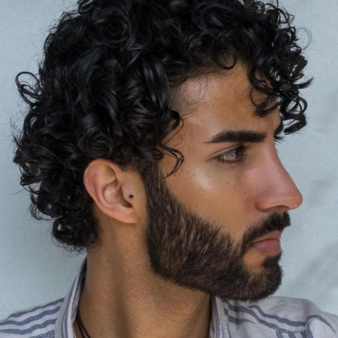 curly haired man