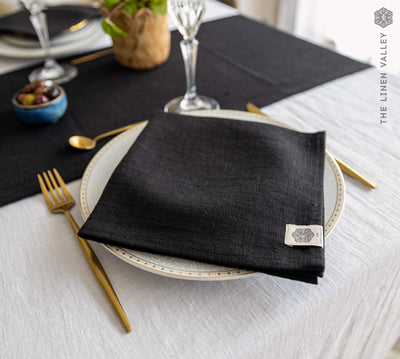Introducing our black linen napkins set, designed to elevate your dining experience with a touch of warmth and charm