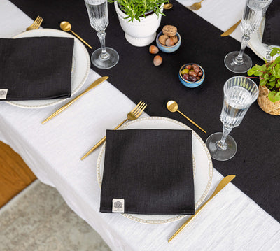 Introducing our black linen napkins set, designed to elevate your dining experience with a touch of warmth and charm