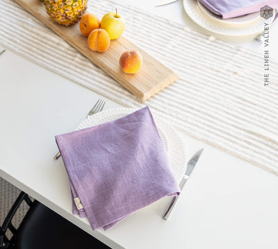 Introducing our light purple linen napkins set, designed to elevate your dining experience with a touch of warmth and charm.