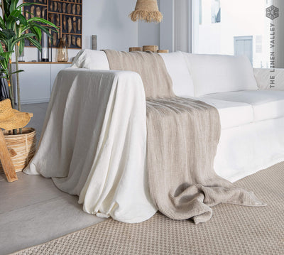Rustic heavy linen waffle throw crafted from a cozy waffle weave, blanket adds a layer of warmth and style to any bedroom decor.