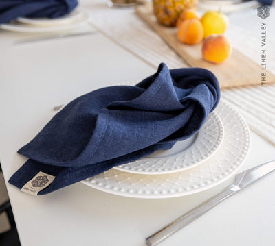 Introducing our navy blue linen napkins set, designed to elevate your dining experience with a touch of warmth and charm.