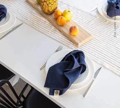 Introducing our navy blue linen napkins set, designed to elevate your dining experience with a touch of warmth and charm.