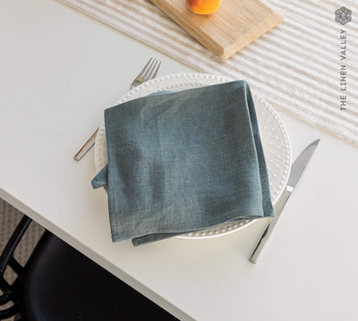 Introducing our teal blue linen napkins set, designed to elevate your dining experience with a touch of warmth and charm.