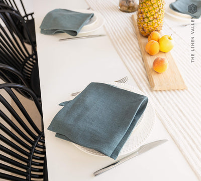 Introducing our teal blue linen napkins set, designed to elevate your dining experience with a touch of warmth and charm.