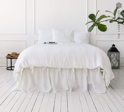 Present our luxurious bright white linen duvet cover Set, designed to elevate both the aesthetic appeal and comfort level of your bedroom.