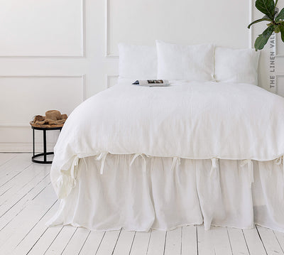 Present our luxurious bright white linen duvet cover Set, designed to elevate both the aesthetic appeal and comfort level of your bedroom.