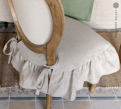 Our rustic unbleached linen slipcovers offer both practicality and aesthetic appeal.