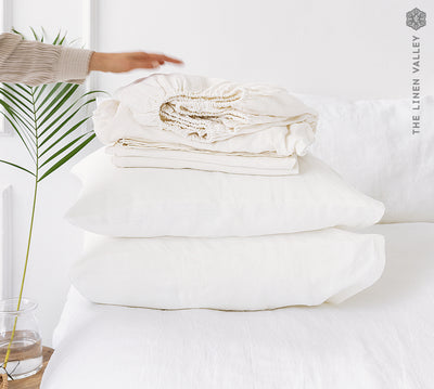 Embrace the essence of relaxation and indulge in the unparalleled luxury of our optical white linen sheet sets.