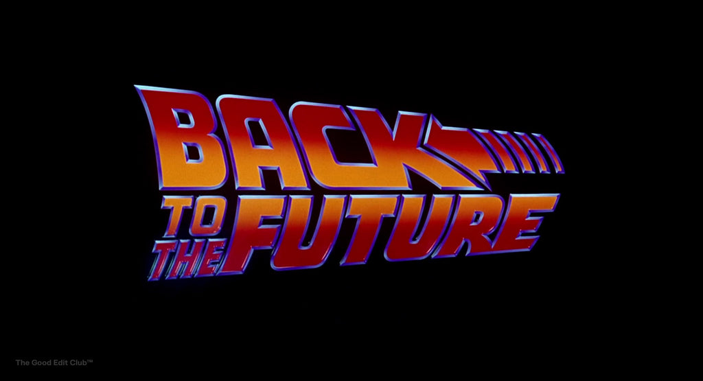 Back to the Future (1985) film title in bold chrome text effect with a high contrast, bevelled outline, projecting a retro-futuristic vibe synonymous with the film's time-travel theme.