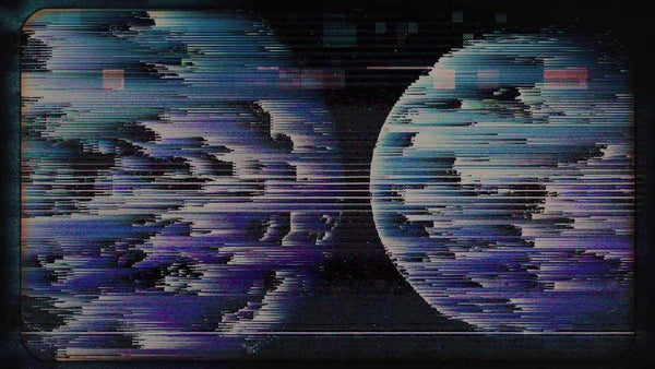 Still from Coldplay's 'Higher Power' music video, showing a heavily distorted image of two planets on a VHS screen