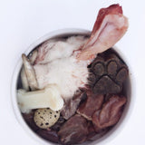 Raw pet food bowl with rabbit