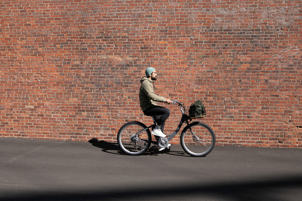 man riding sol bike 