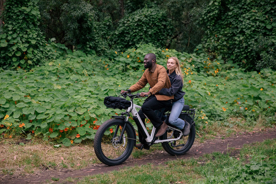 man and woman on back of Ultra bike