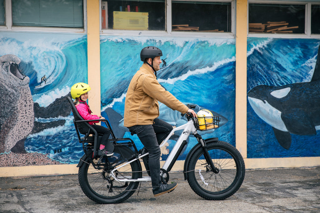 father and daughter on ultra bike