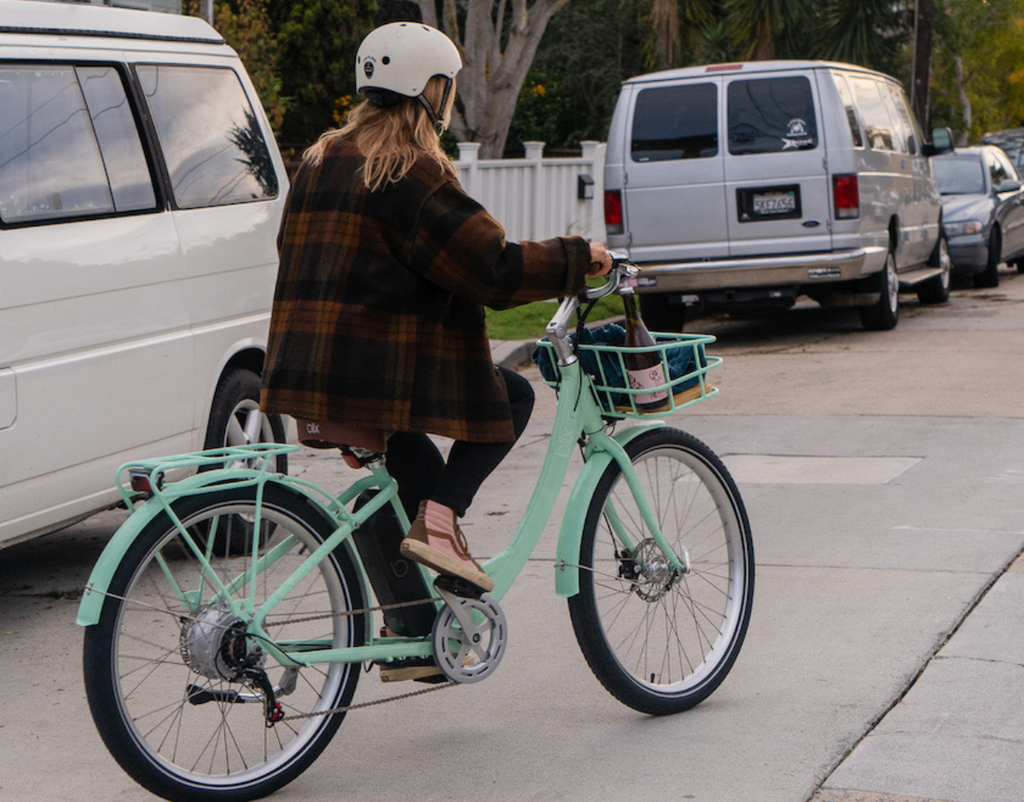 woman on sol eclipse bike