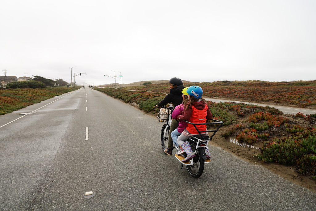 woman and kids on packa