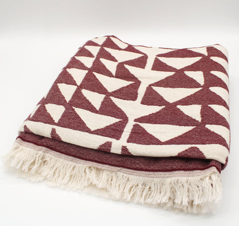 maroon and beige triangle throw blanket