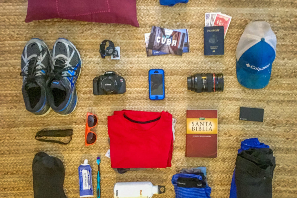 Gardner Tours Cuba Packing List Photo of Items laid out on the floor before putting them in luggage