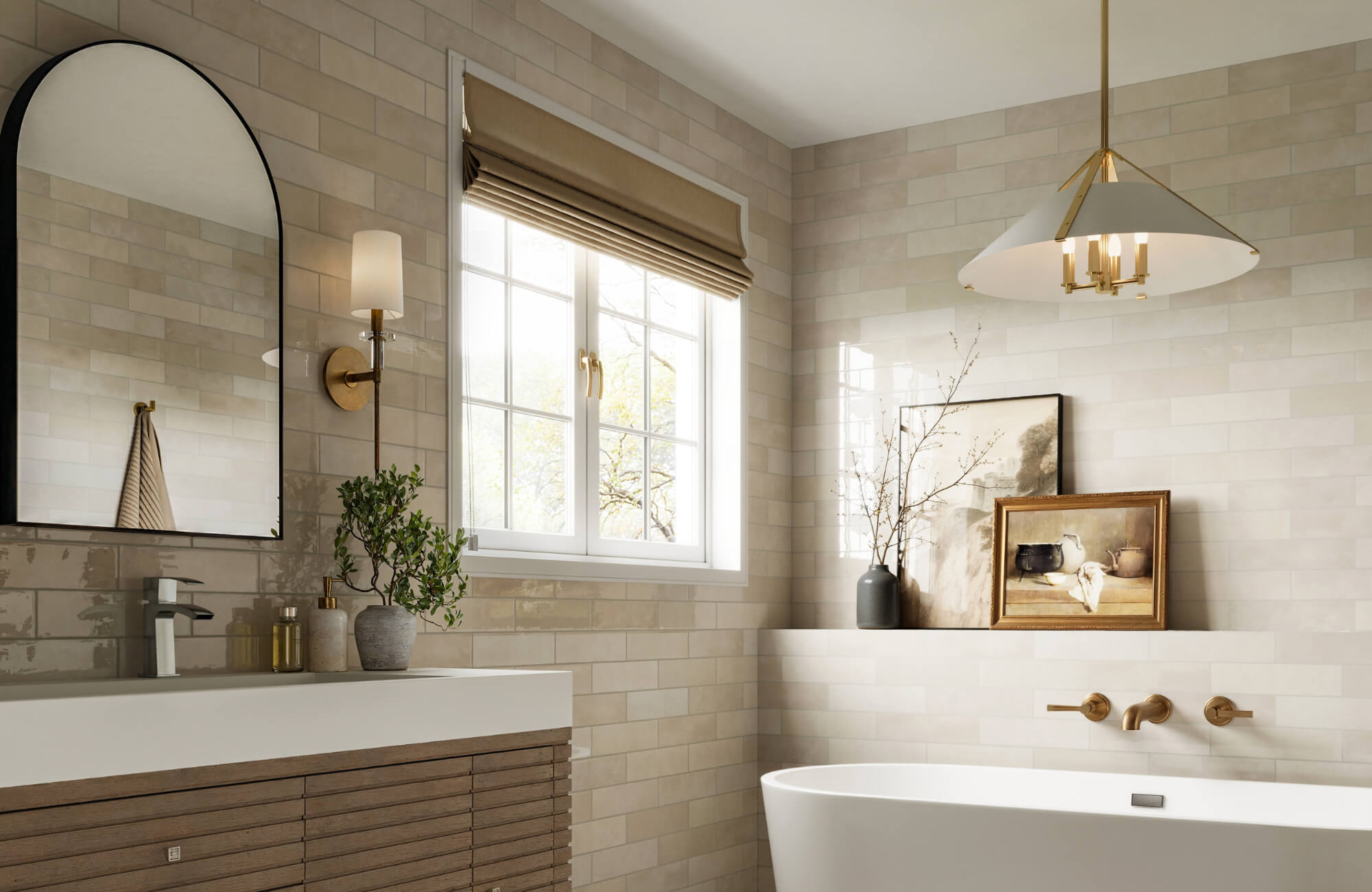 Neutral-toned bathroom with a black-framed arched mirror, modern vanity, freestanding tub, and warm brass fixtures for a serene, elegant look.