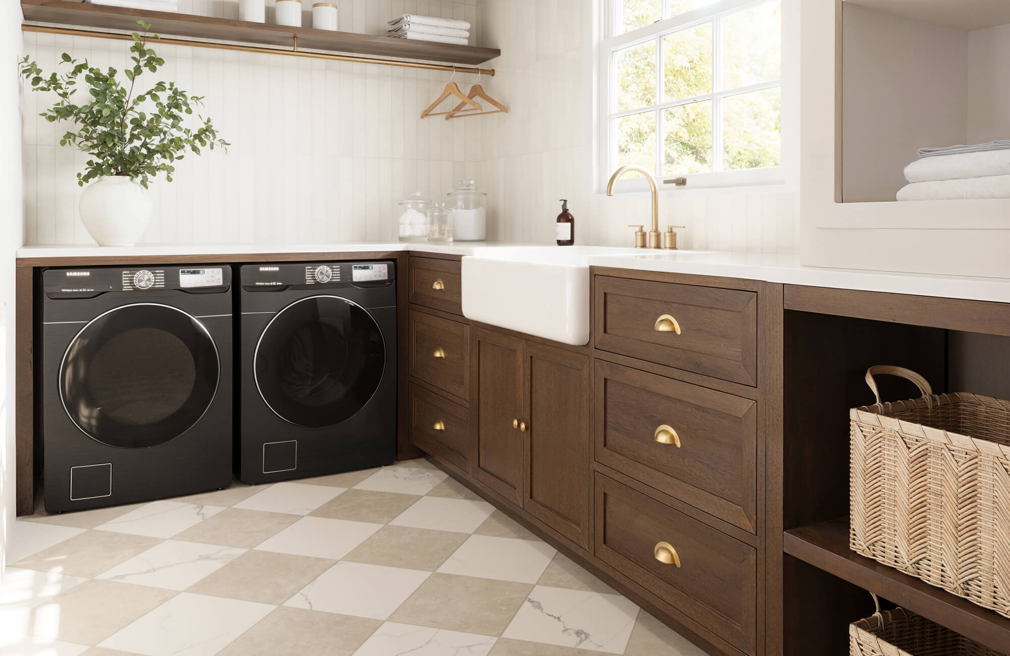 Matte checkerboard tiles in warm beige and white marble bring a classic touch to this laundry room, complementing the rich wood cabinetry.
