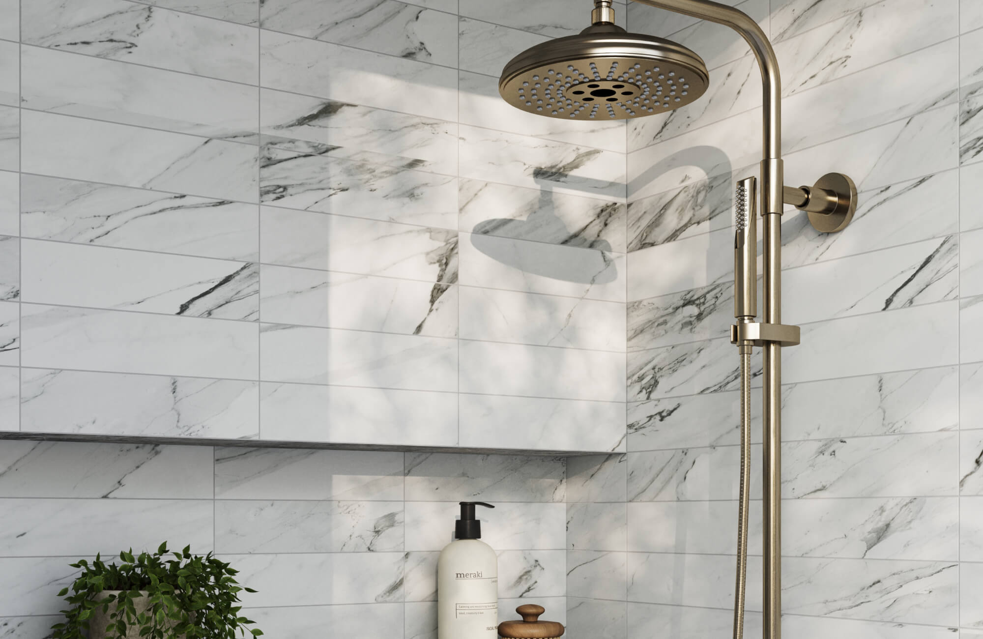 Luxurious shower with marble-look tiles featuring subtle veining, enhanced by modern gold fixtures for a sophisticated and stylish design.