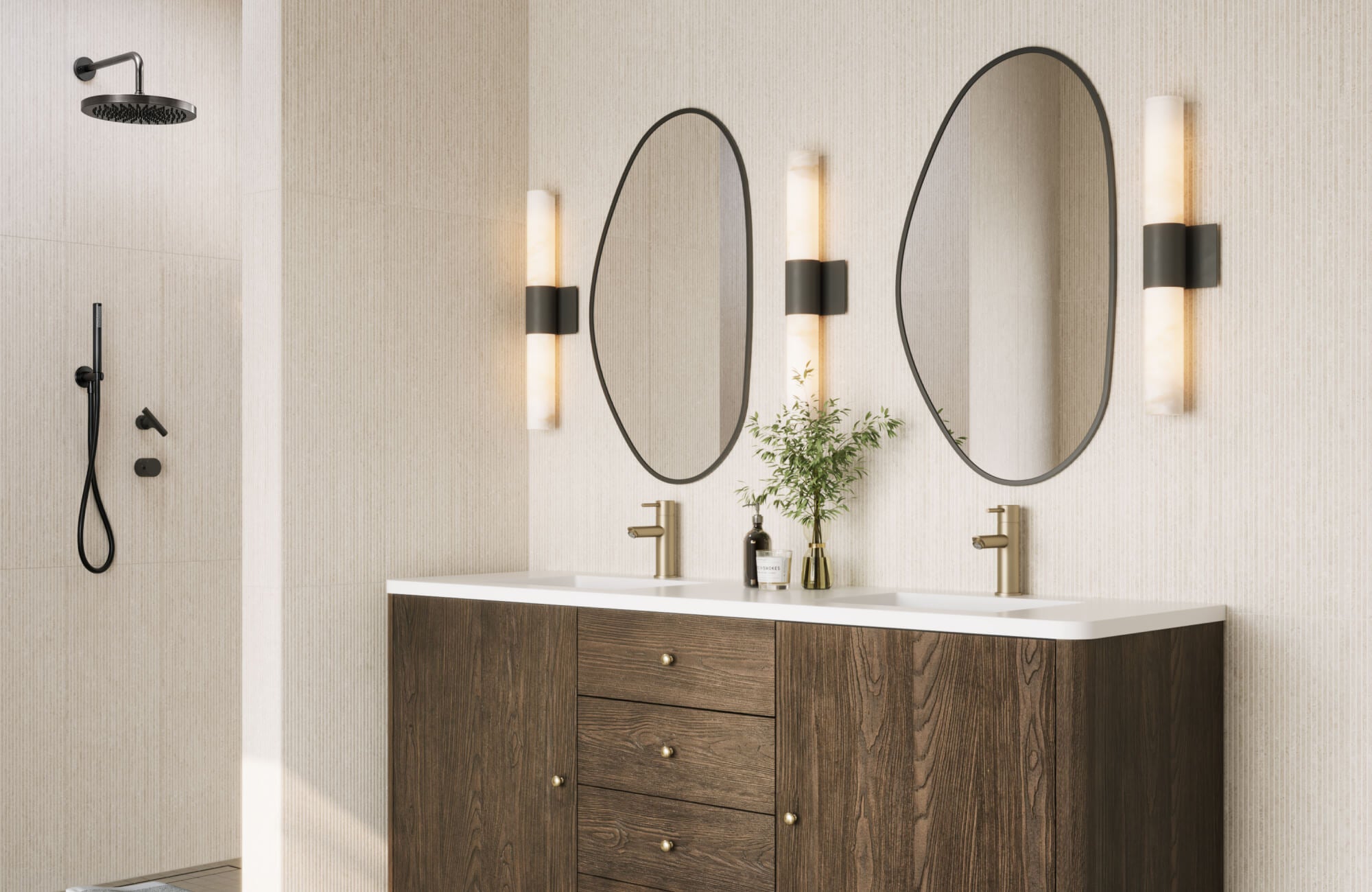Sleek double-sink vanity with rounded mirrors and warm wall lighting, paired with a walk-in shower and black matte fixtures.