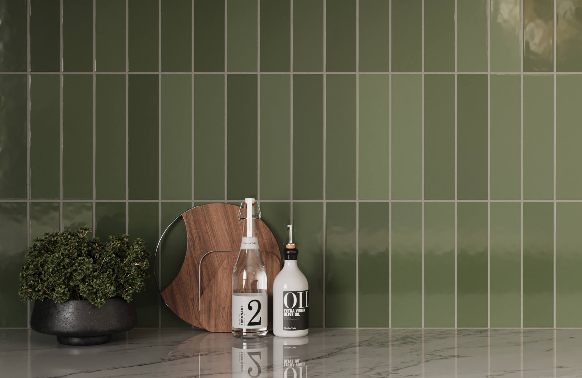 Sage green subway tile wall in kitchen with wooden accessories and marble counter