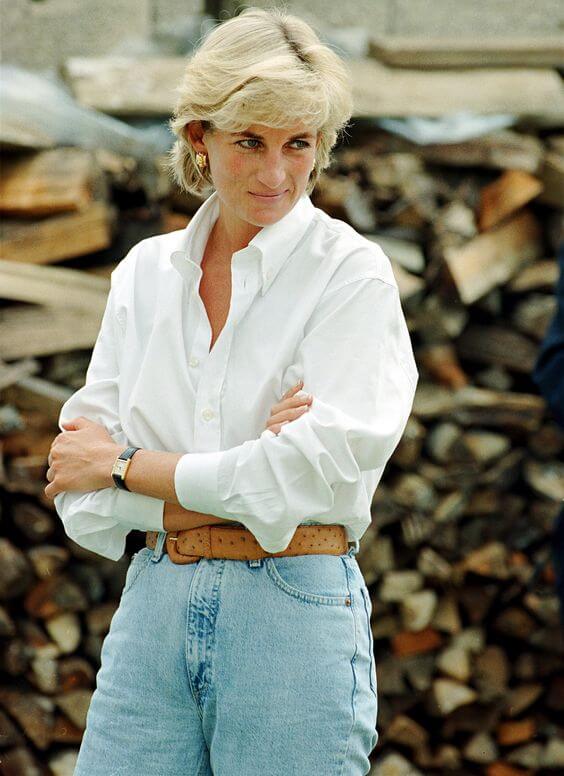 princess diana wearing jeans and a white top with cartier watch