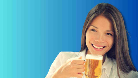 A woman drinking beer