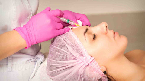 a person receiving a botox injection