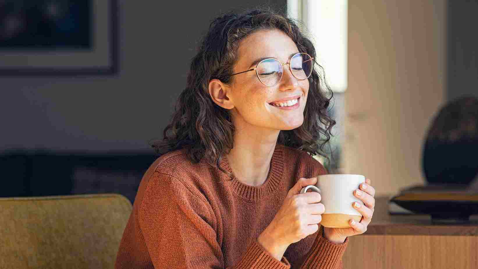 A woman having coffee