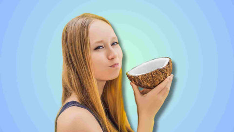 A woman practicing oil pulling mouthwash