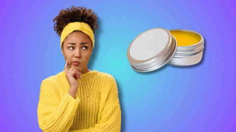 a woman showing oil for oil pulling