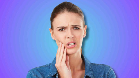 A woman having tooth ache