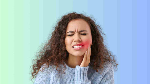 A woman having tooth sensitivity