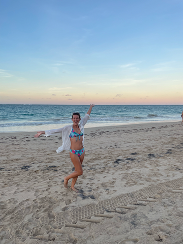 Ashley on the beautiful beaches at sunset in San Juan, Puerto Rico