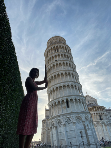 Recreating the iconic picture of holding up the Leaning Tower of Pisa