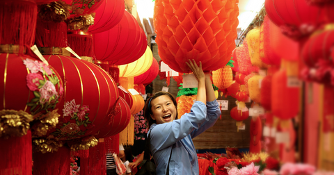 Woman holding lantern for Chinese New Year