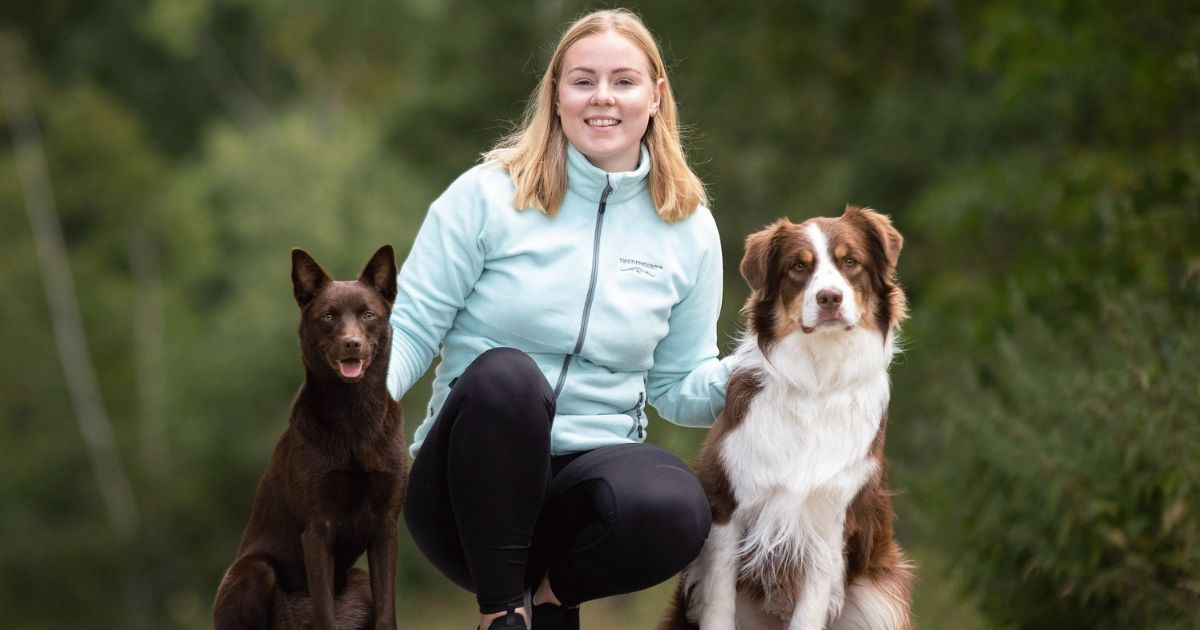 Nathalie with her two agility dogs