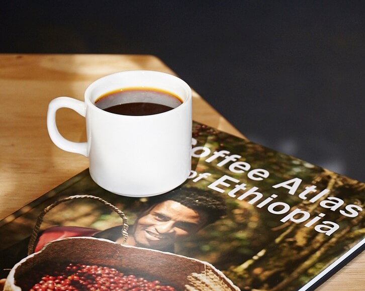 Coffee on top of Coffee Atlas of Ethiopia book