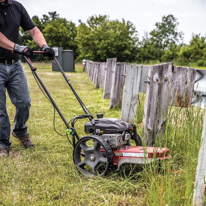 Walk Behind String Mower (160cc) in action easily cutting grass