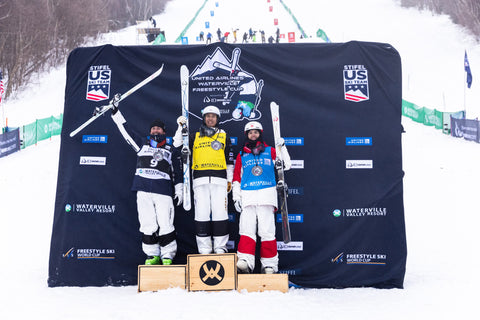 Photo of Ikuma Horishima, Cooper Woods, and Mikaël Kingsbury at the United Airlines Waterville Freestyle Cup Presented by ID one USA