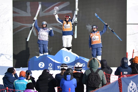 Overall Podium Photo of Jakara Anthony, Jaelin Kauf, and Olivia Giaccio