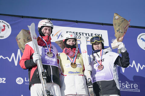 Photo of Elliot Vaillancourt, Mikaël Kingsbury, and Ikuma Horishima - FIS Freestyle Moguls World Cup - Alpe d'Huez, France 2023