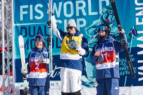 Podium photo of Jakara Anthony, Jaelin Kauf, and Elizabeth Lemley