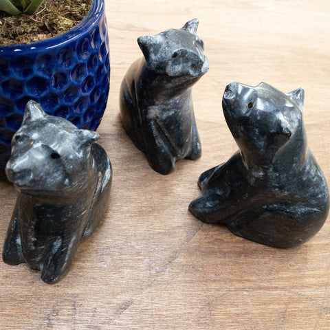 three black onyx bears shown from different angles