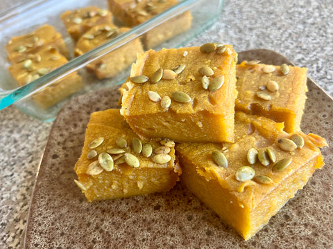 Slices of ʻulu pumpkin mochi with a chewy texture, perfect for gluten-free holiday treats.