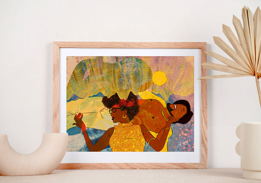 A framed art print on a table with beige decor. The art print features a Black woman laying on a Black man's stomach. She has glasses and a curly afro and is dressed in a gold glittery shirt. Her left hand is caressing the man's cheek and her right hand is holding his leg. The man is dressed in a yellow shirt and yellow pants and he is holding a yellow ball- a sun. They are laying against a blue abstract background and there are gold wavy lines hanging above them.