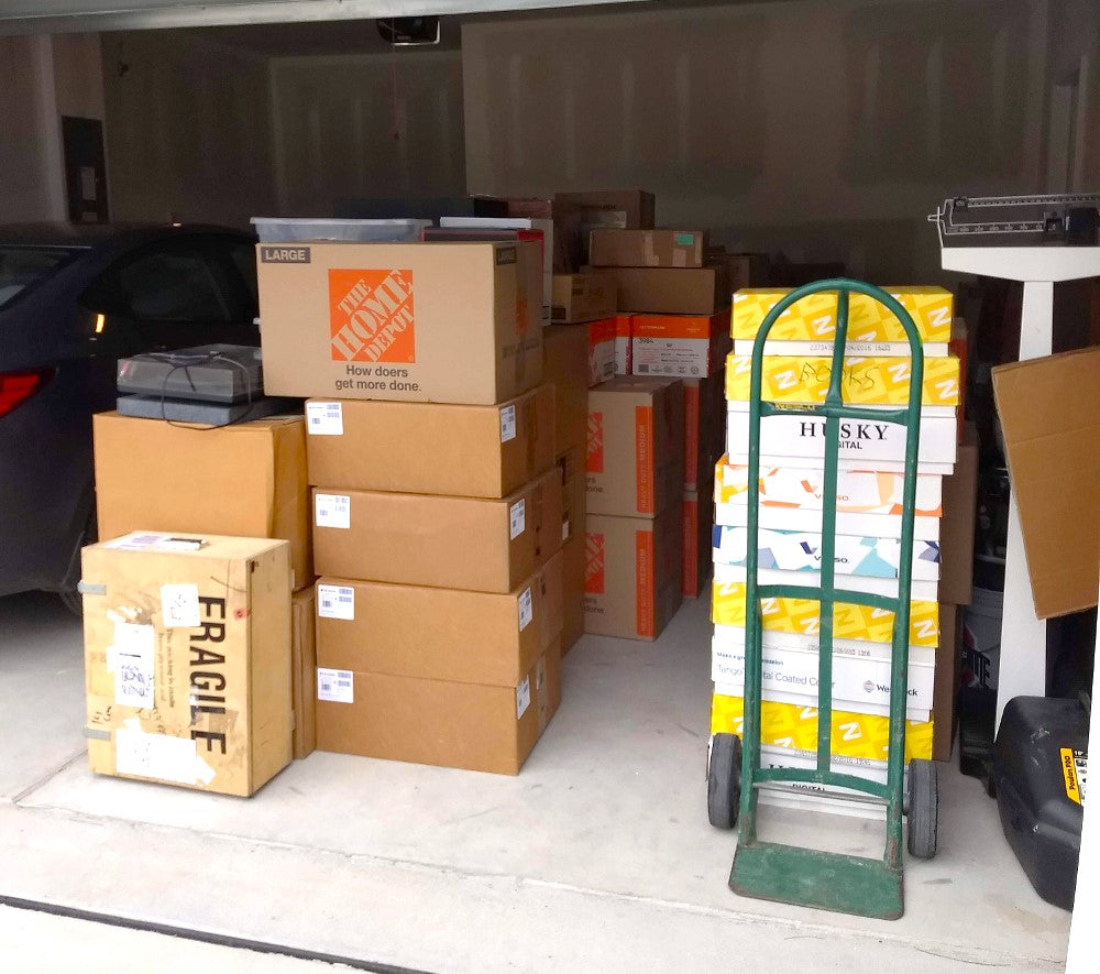 Audio equipment, CDs, LPs, RCA dogs, and Buddhas awaiting the heavy lifting to the audio suite.